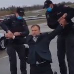 Calgary pastor arrested in the street.