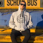 A hoodie on a beaten school bus