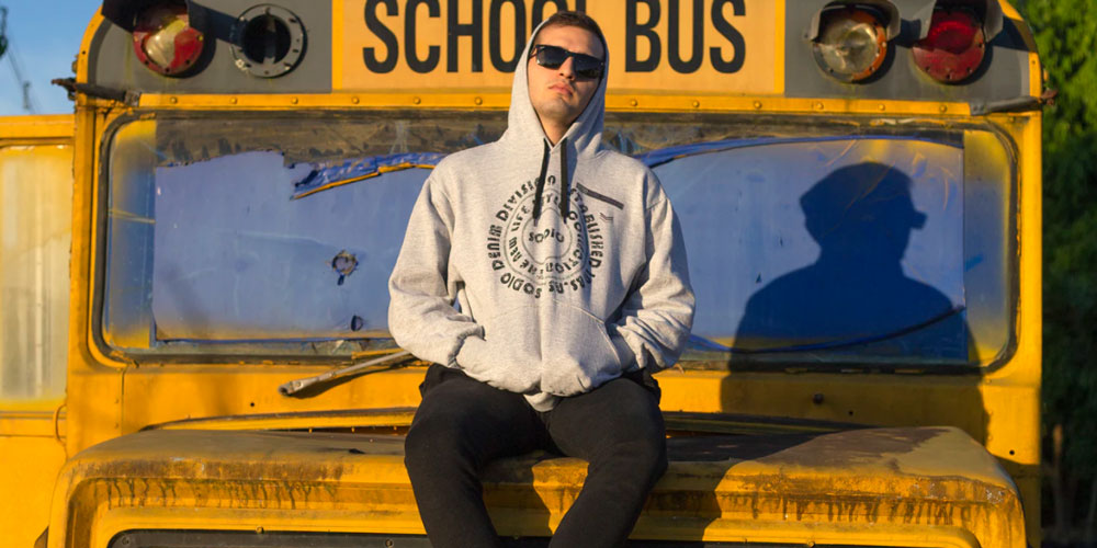 A hoodie on a beaten school bus