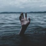 A drowning person's hand