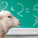 A sheep at a blackboard with 1984 math