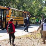 Providence students disembark for school