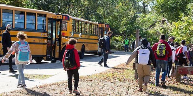 Providence students disembark for school