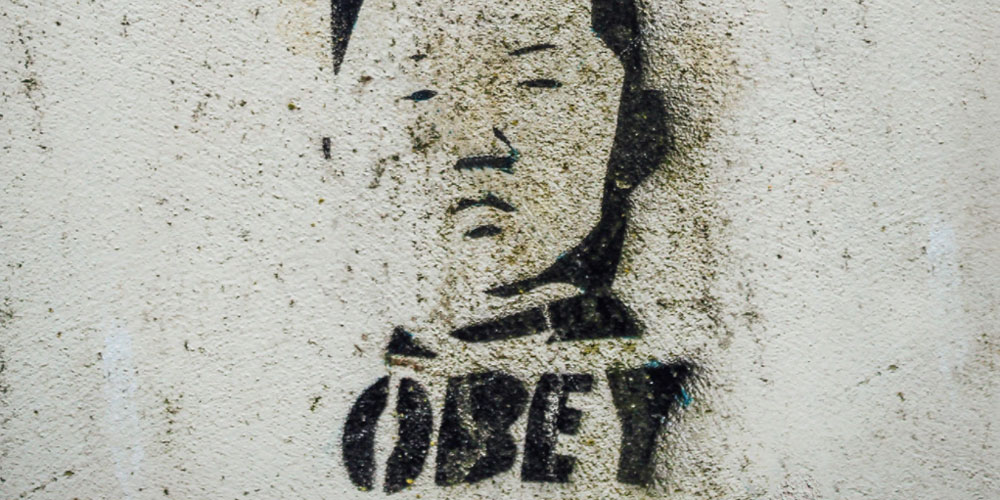 Obey Kim Jong-Un graffitti