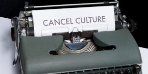 A "cancel culture" document in a typewriter
