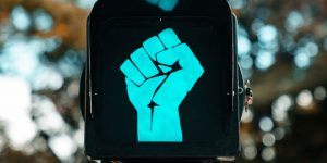 Racial conflict fist as a green light