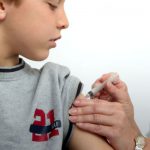 A boy receiving a vaccine