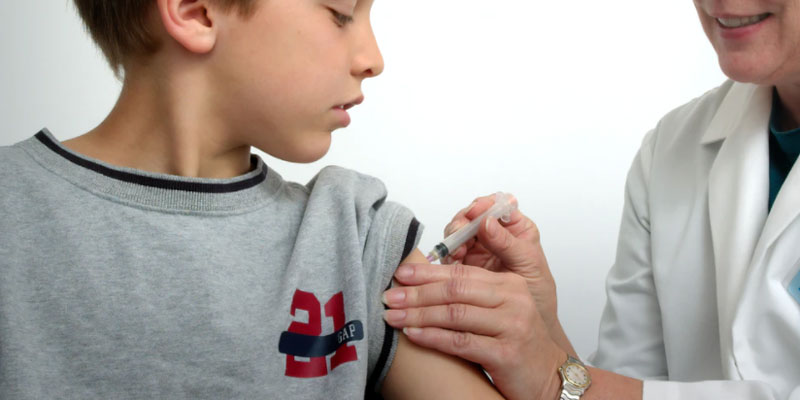 A boy receiving a vaccine