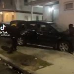 Hooded youths vandalize a car in Providence