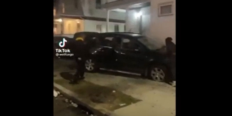 Hooded youths vandalize a car in Providence