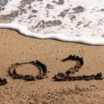 2021 written in beach sand