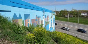 A mural on a highway bridge