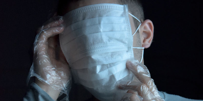 A man with a full face medical mask