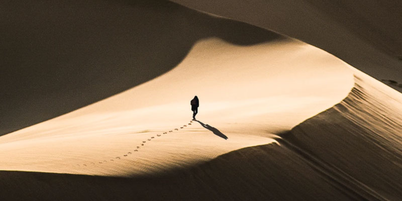 Man walking in the desert