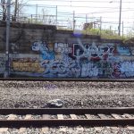 Graffiti by railroad tracks