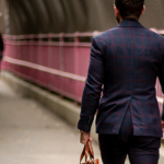 Man in a suit walking