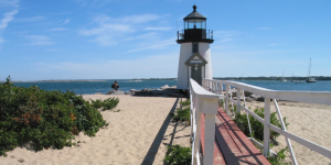 A beach and light house in Nantucket