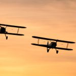 Sunset pictures of two biplanes