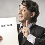 Shady businessman with contract