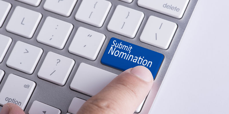 A "Submit Nomination" button on a keyboard